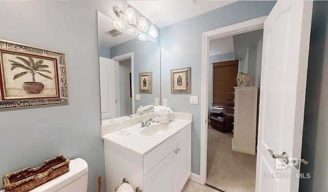 29235 Perdido Beach Blvd Unit 203, Orange Beach, AL 36561 - bathroom with vanity and toilet