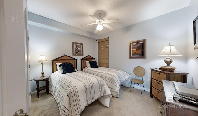 29235 Perdido Beach Blvd Unit 203, Orange Beach, AL 36561 - bedroom with light carpet and ceiling fan