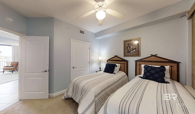 29235 Perdido Beach Blvd Unit 203, Orange Beach, AL 36561 - bedroom featuring light carpet and ceiling fan