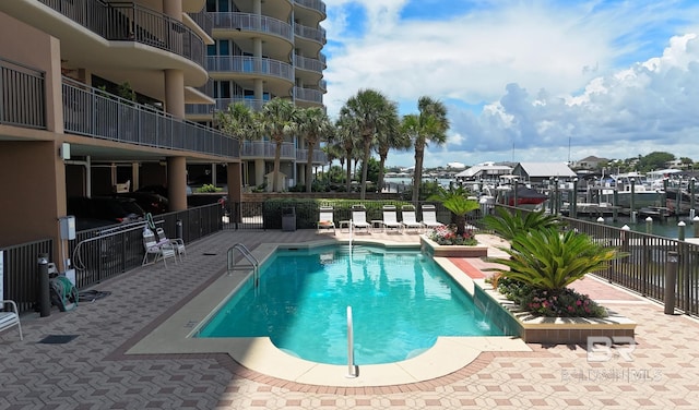29235 Perdido Beach Blvd Unit 203, Orange Beach, AL 36561 - community pool featuring a patio area