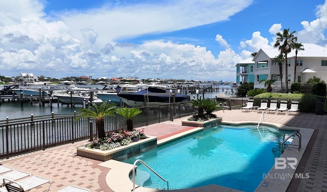 29235 Perdido Beach Blvd Unit 203, Orange Beach, AL 36561 - community pool with a water view and a patio