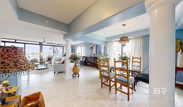 29235 Perdido Beach Blvd Unit 203, Orange Beach, AL 36561 - dining space with decorative columns, healthy amount of natural light, and light tile patterned floors