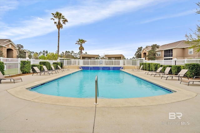 view of swimming pool featuring a patio