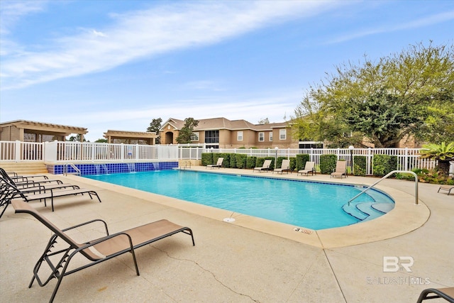 view of pool featuring a patio area