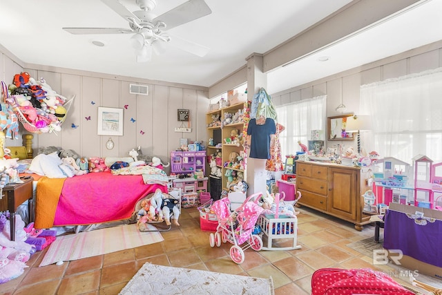 bedroom with light tile patterned flooring and ceiling fan