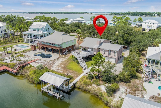 aerial view featuring a water view