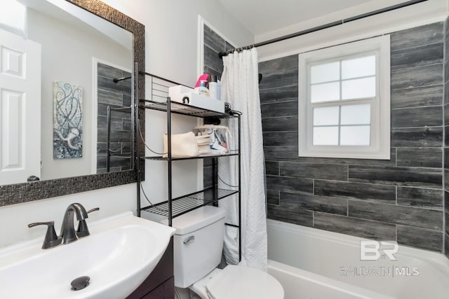 full bathroom featuring vanity, toilet, and shower / bathtub combination with curtain