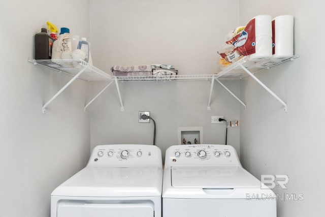 clothes washing area with laundry area and washing machine and dryer