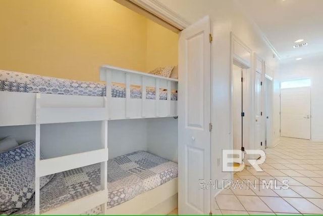 bedroom with tile patterned floors