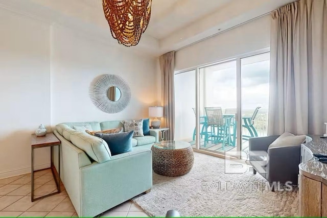 sitting room with light tile patterned floors and baseboards