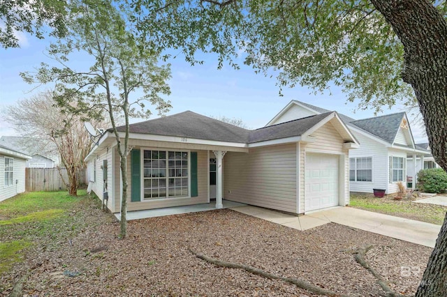 single story home featuring a garage