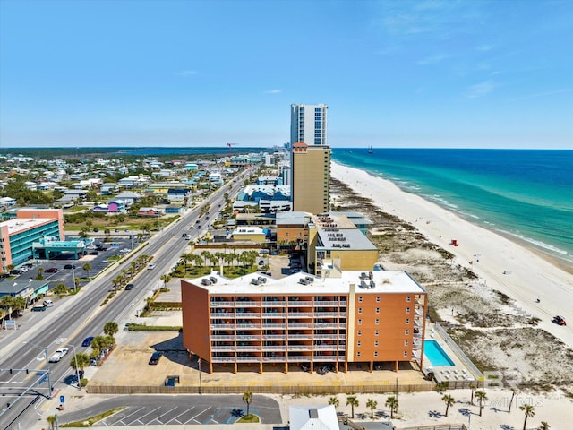 drone / aerial view of expansive beach and apartment complex / building