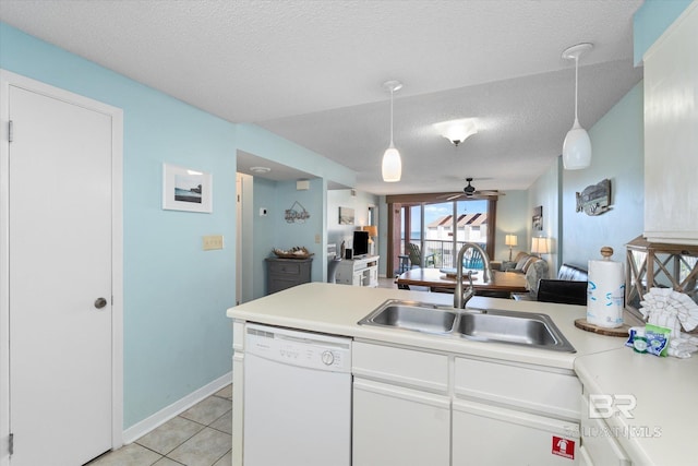 kitchen with dishwasher, a sink, a textured ceiling, ceiling fan, and open floor plan