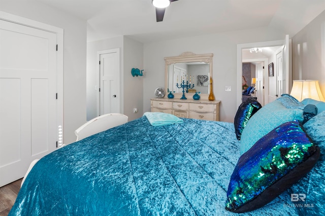 bedroom featuring hardwood / wood-style floors and ceiling fan