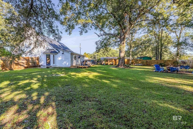 view of yard featuring a wooden deck