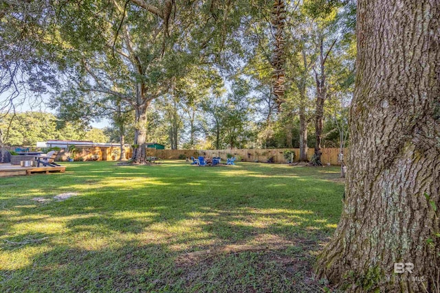 view of yard featuring a deck