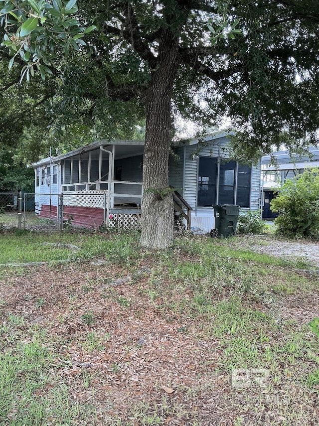 84 Horn Dr, Lillian, AL 36549 - view of front of house featuring a sunroom