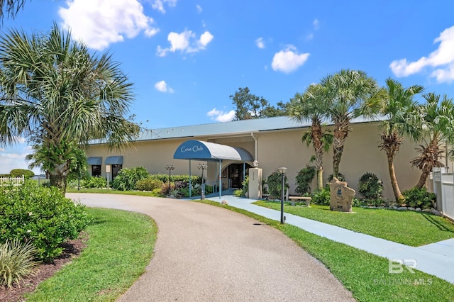 84 Horn Dr, Lillian, AL 36549 - view of property's community with curved driveway and a lawn