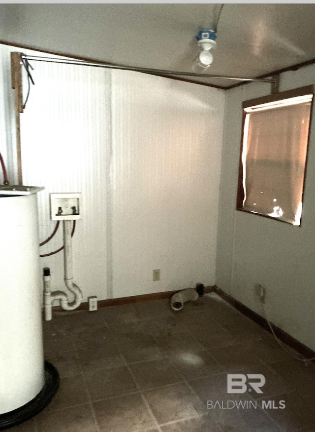 84 Horn Dr, Lillian, AL 36549 - washroom with tile patterned floors, washer hookup, baseboards, and water heater