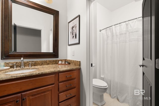 bathroom with tile patterned flooring, vanity, a shower with shower curtain, and toilet