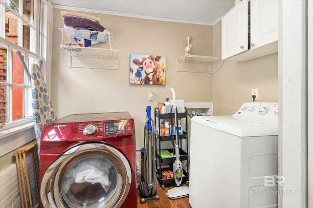 20 Hurlbert St, Mobile, AL 36607 - washroom featuring cabinet space, washer and dryer, crown molding, and wood finished floors