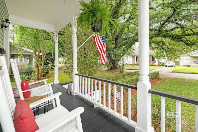 20 Hurlbert St, Mobile, AL 36607 - wooden terrace with a porch