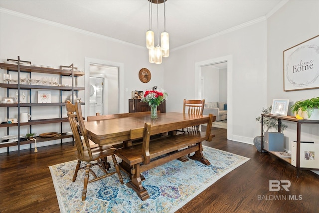 20 Hurlbert St, Mobile, AL 36607 - dining room featuring crown molding, wood finished floors, baseboards, and a chandelier