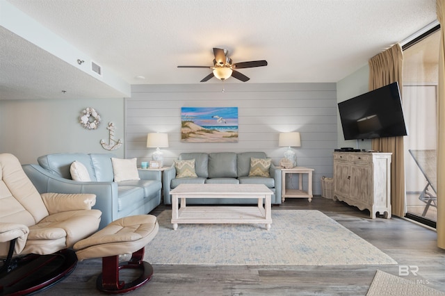 24400 Perdido Beach Blvd Unit 701, Orange Beach, AL 36561 - living area featuring visible vents, a ceiling fan, wood finished floors, and a textured ceiling