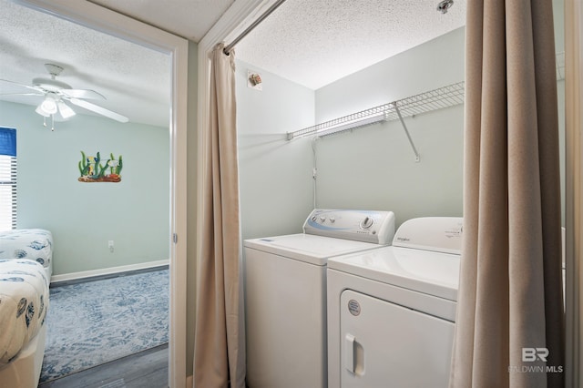 24400 Perdido Beach Blvd Unit 701, Orange Beach, AL 36561 - laundry room featuring washer and dryer, a ceiling fan, laundry area, a textured ceiling, and wood finished floors