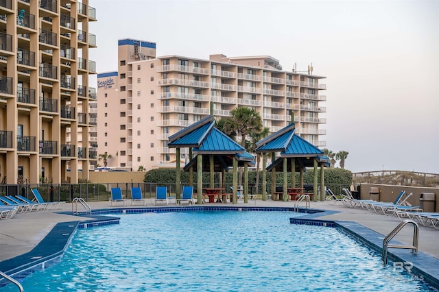 24400 Perdido Beach Blvd Unit 701, Orange Beach, AL 36561 - pool featuring a patio area and fence
