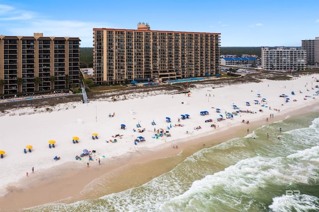 24400 Perdido Beach Blvd Unit 701, Orange Beach, AL 36561 - drone / aerial view featuring a water view, a beach view, and a city view