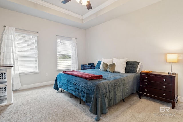 9393 Impala Dr, Foley, AL 36535 - bedroom with a ceiling fan, baseboards, crown molding, a raised ceiling, and carpet flooring