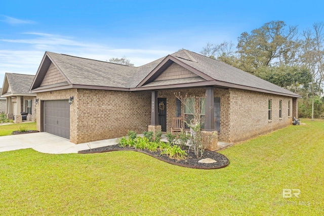 view of front of home with roof with shingles, concrete driveway, a front yard, an attached garage, and brick siding