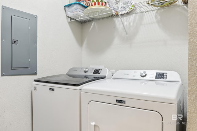 9393 Impala Dr, Foley, AL 36535 - laundry room with laundry area, electric panel, washing machine and dryer, and a textured wall
