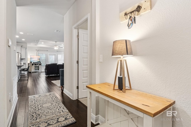 9393 Impala Dr, Foley, AL 36535 - hall with visible vents, baseboards, recessed lighting, dark wood-style flooring, and a textured wall