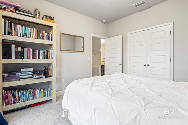 9393 Impala Dr, Foley, AL 36535 - carpeted bedroom featuring a closet, visible vents, and baseboards