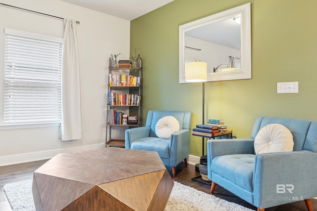 9393 Impala Dr, Foley, AL 36535 - living area featuring wood finished floors and baseboards