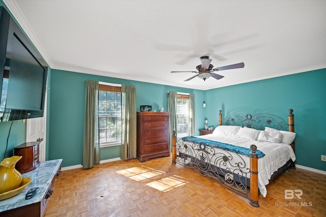 bedroom with crown molding, a textured ceiling, light parquet flooring, and ceiling fan