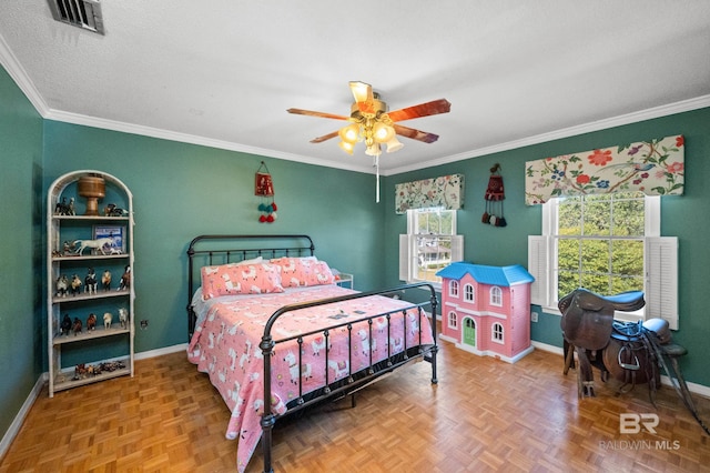 bedroom featuring parquet flooring, ceiling fan, ornamental molding, and a textured ceiling