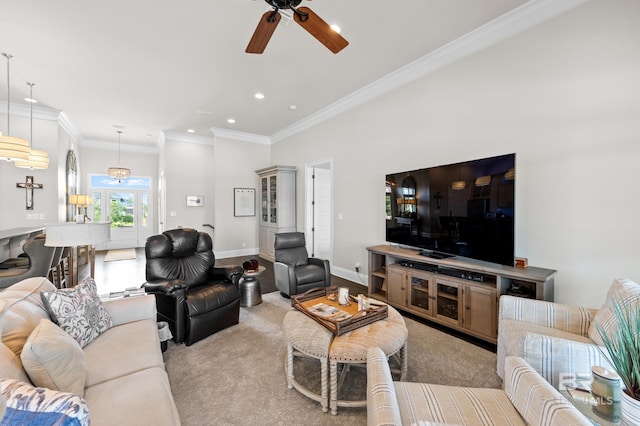 living room with ceiling fan, ornamental molding, light carpet, and french doors