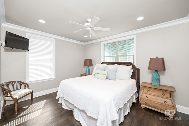 bedroom with ceiling fan, dark hardwood / wood-style flooring, and crown molding