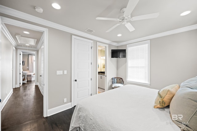 bedroom featuring dark hardwood / wood-style floors, ensuite bath, ceiling fan, and crown molding