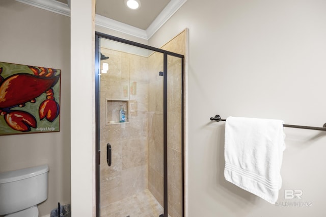 bathroom with crown molding, an enclosed shower, and toilet