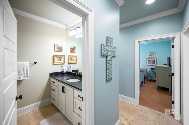 bathroom with vanity and crown molding