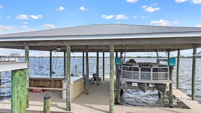 dock area featuring a water view