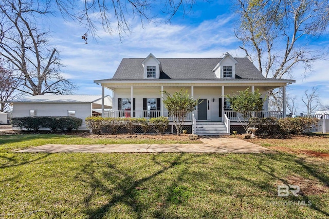 view of front of property featuring covered porch and a front yard