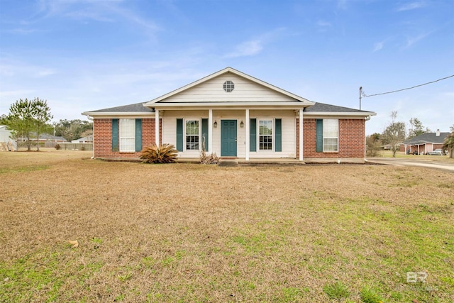 ranch-style house featuring a front lawn