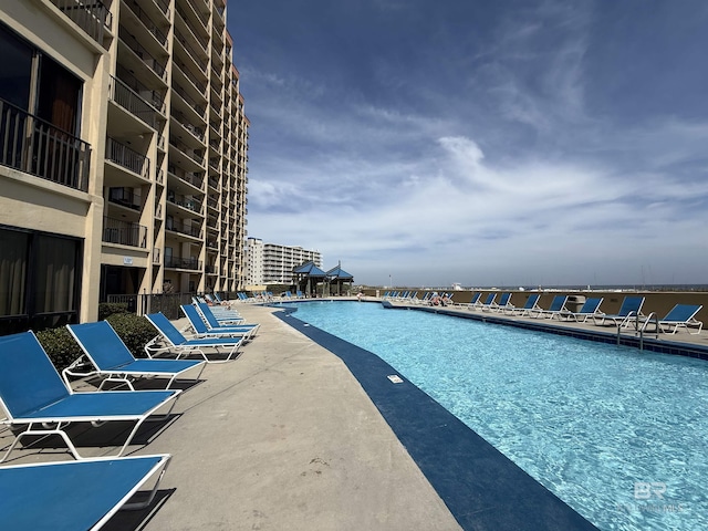 pool with a patio