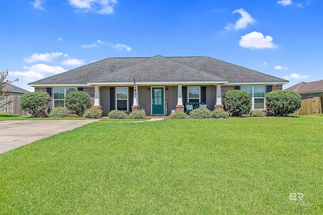 ranch-style house with a front lawn