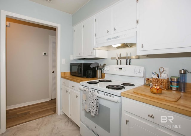 kitchen with white cabinets and white electric range